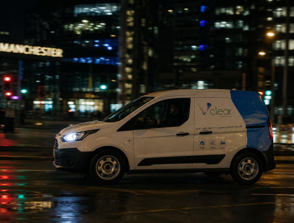 Vclear van driving through Manchester at night